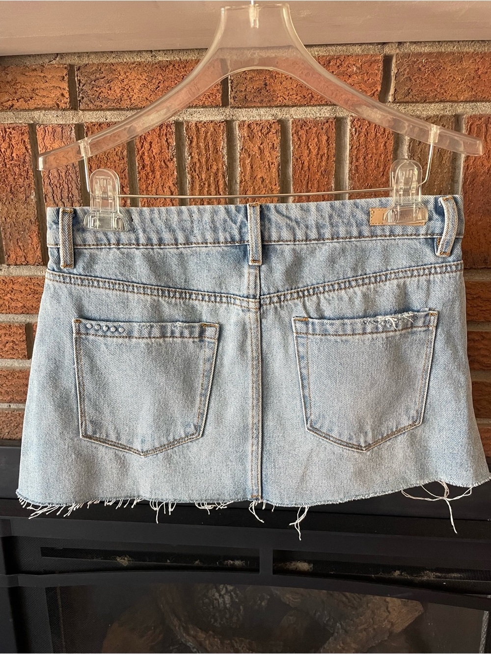 Revolve Denim Mini Skirt with Raw Hem